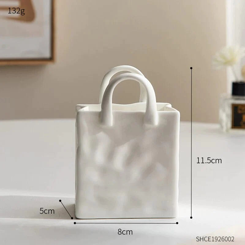 Originelle Vase in Form einer Handtasche 